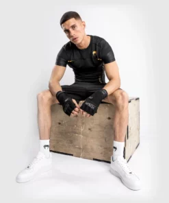 Venum Tempest 2.0 Rashguard - Short Sleeves - MMA Factory -MMA FACTORY Shop 0026f433b8b6d984e60bd561b1cea87eaf7597a6 rashguards ss tempest2.0 black gold 08 1