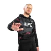 UFC Venum Fight Week 2.0 Pullover Hoodie - MMA Factory -MMA FACTORY Shop 85b0ac62e8225c095f22b44381ae916af2fb30eb hoodie fightweeks 2.0 black 14.5