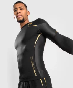 Venum Tempest 2.0 Rashguard - Long Sleeves - MMA Factory -MMA FACTORY Shop b95722107ceafc0c82bed48f897860f45c60f1df rashguards ls tempest2.0 black gold 07 1